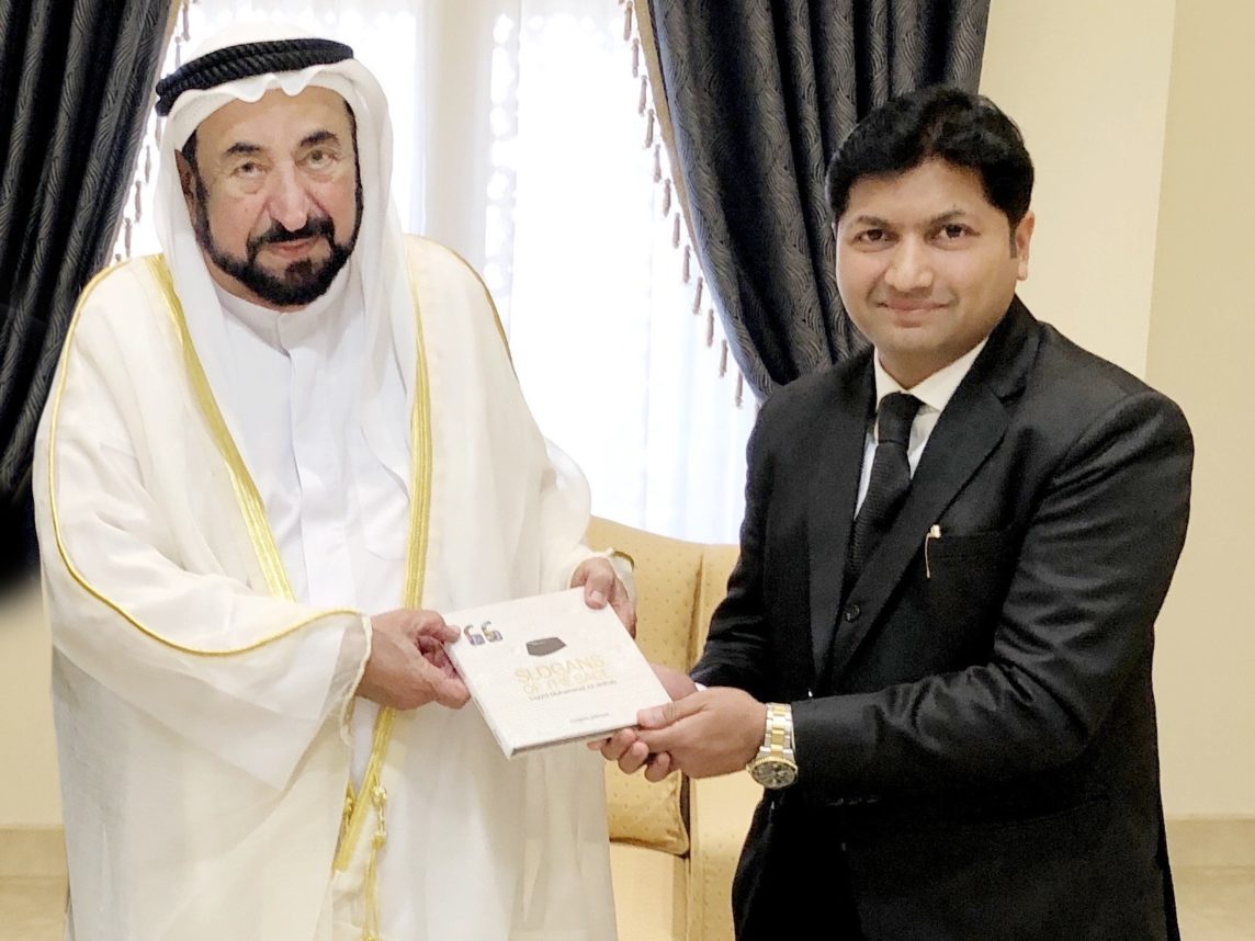 Mujeeb Jaihoon presents SLOGANS OF THE SAGE to Dr. Sheikh Sultan, ruler of Sharjah
