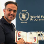 Wasim Samara, UN WFP, with the book, Slogans of the Sage